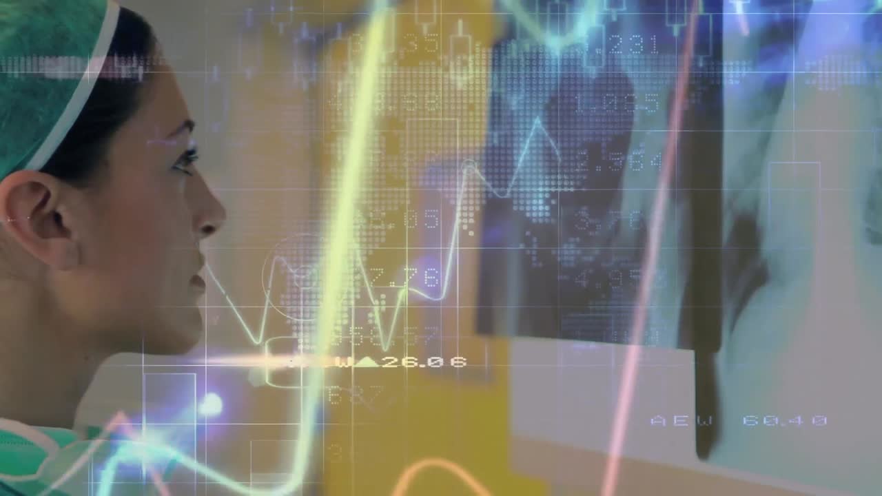 un cirujano está mirando rayos x en un hospital