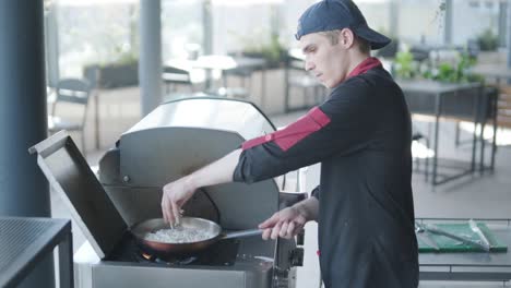 chef cooking food outdoors