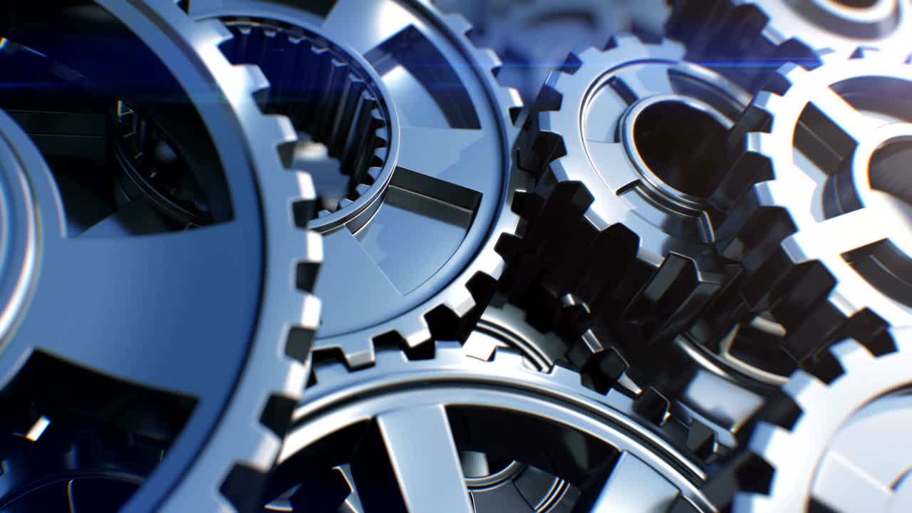 engranajes metálicos girando en el mecanismo de trabajo de primer plano con borrón dof y llamaradas. hermosa animación 3d en bucle. proceso de trabajo abstracto. trabajo en equipo concepto de negocio y tecnología.