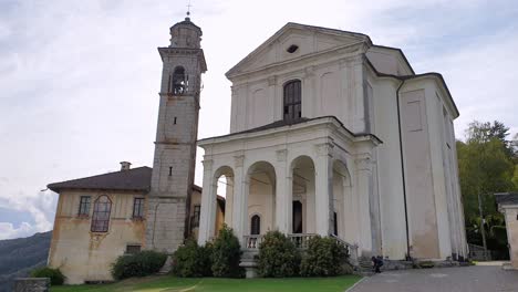 Girl-child-plays-on-churchyard-of-Madonna-del-Sasso-church