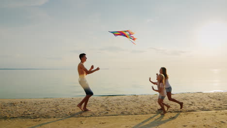 The-Elder-Brother-Is-Playing-With-His-Younger-Sisters-Running-With-A-Kite-Girls-Are-Catching-Up-With