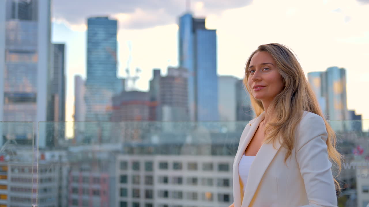 Blonde woman at the Main Tower with Observation Platform in Frankfurt, Germany