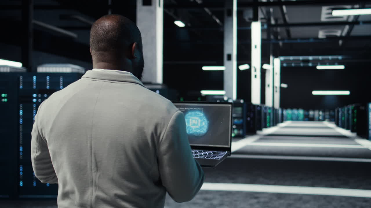 Vertical video IT expert walking in server hub using laptop to enhance AI model accuracy