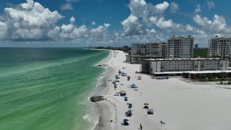 drone view of beach and condominiums near sarasota florida