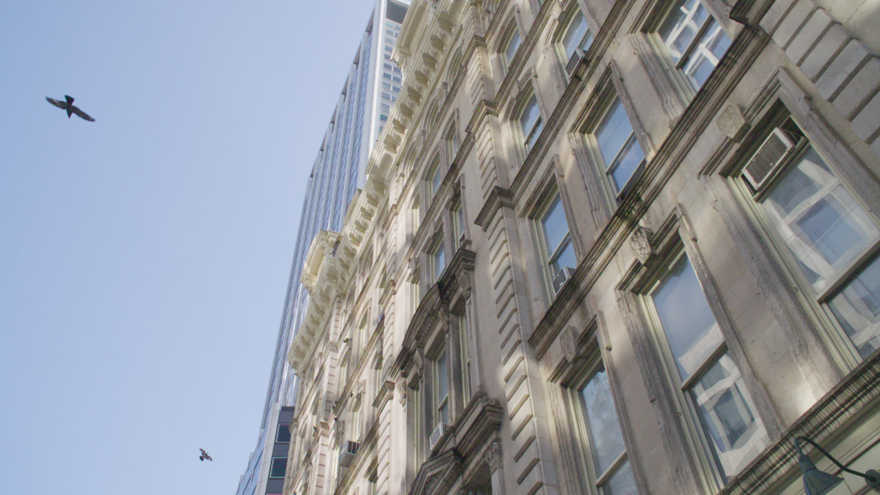 Establishing shot of a Building Exterior in Midtown Manhattan. Shot on a summer morning in New York City.