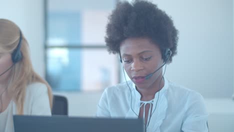 serious african american consultant in headset