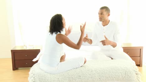 Panorama-of-AfroAmerican-couple-having-an-argument-in-bedroom