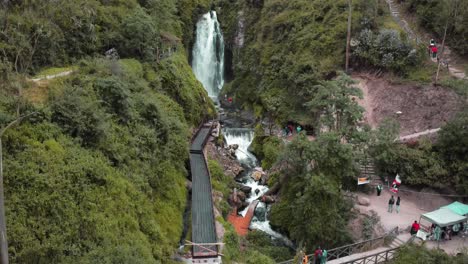 aerial view of wooden bridge leading to peguche waterfalls in otavalo, ecuador