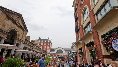 people walking in a bustling city street