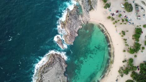 birds eye aerial view of majestic mar chiquita beach lagoon in mushroom shape, puerto rico