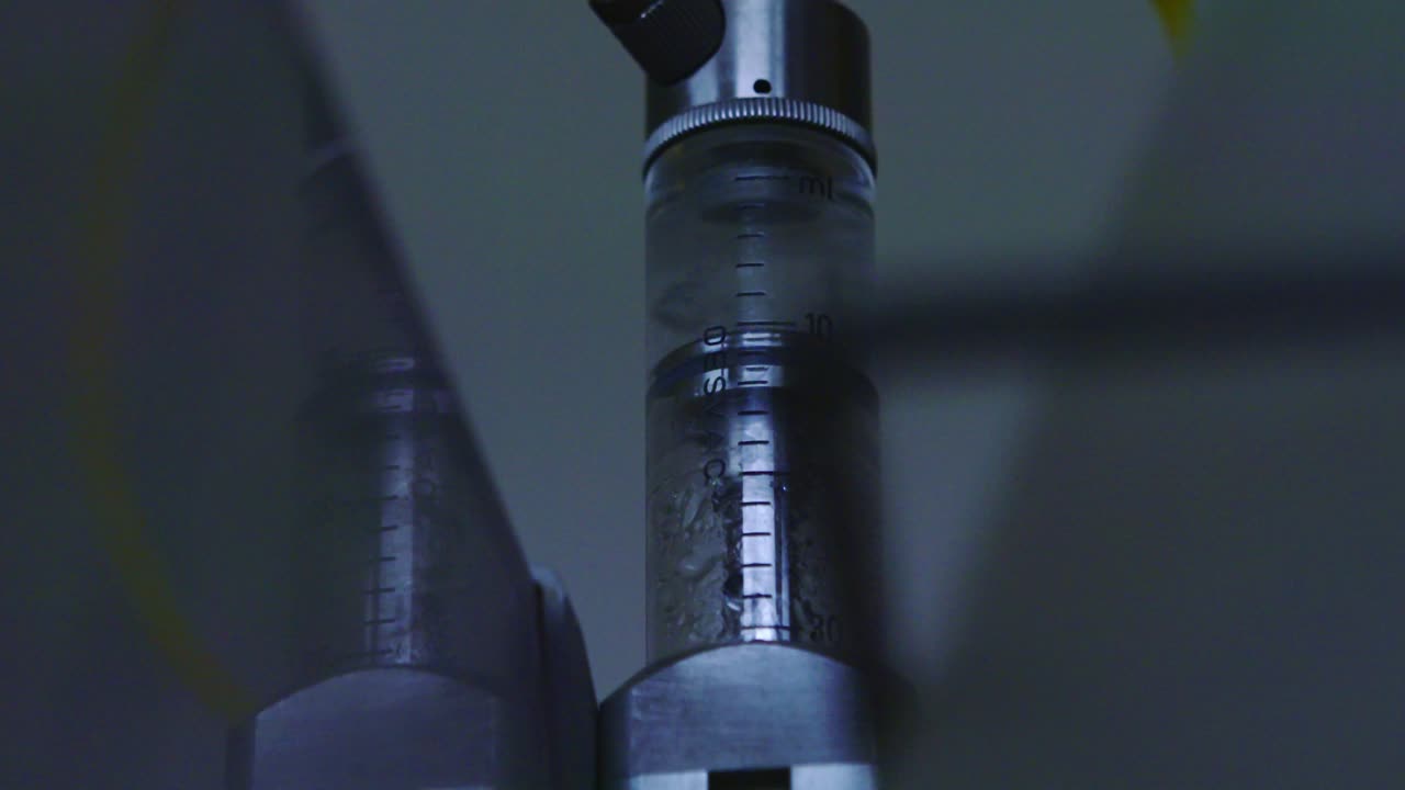 Lab fluid measurement imagery as metaphor for pharma, vaccines, power