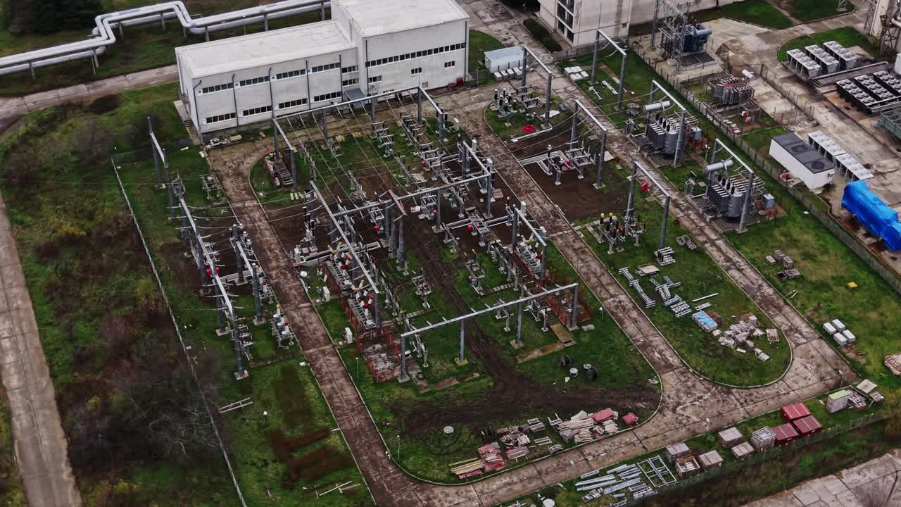 Electrical substation with equipment and structures in a green field