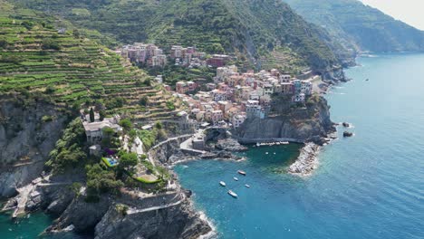 cinque terre manarola coastal village in vernazza, la spezia, liguria, italy - aerial 4k