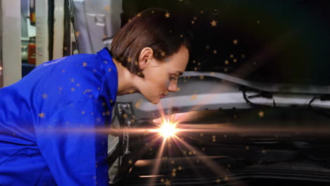 female mechanic inspecting engine bay in automotive garage, with animated bokeh and lens flare
