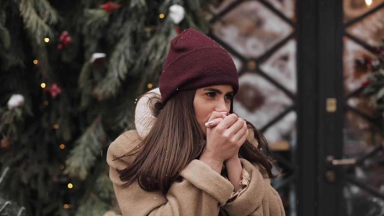 Woman in Winter with Christmas Tree