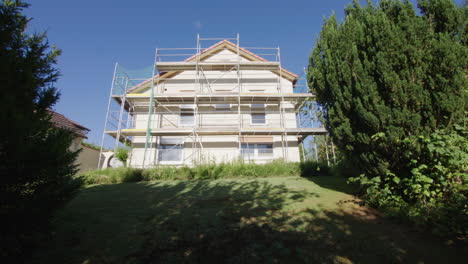 Wide-shot-of-a-house,-which-gets-renovated