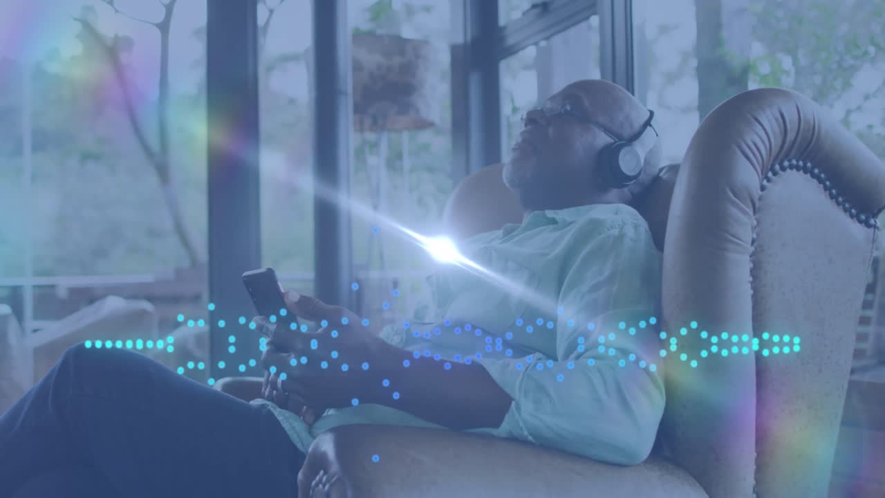 Animation of music data processing over african american man with headphones