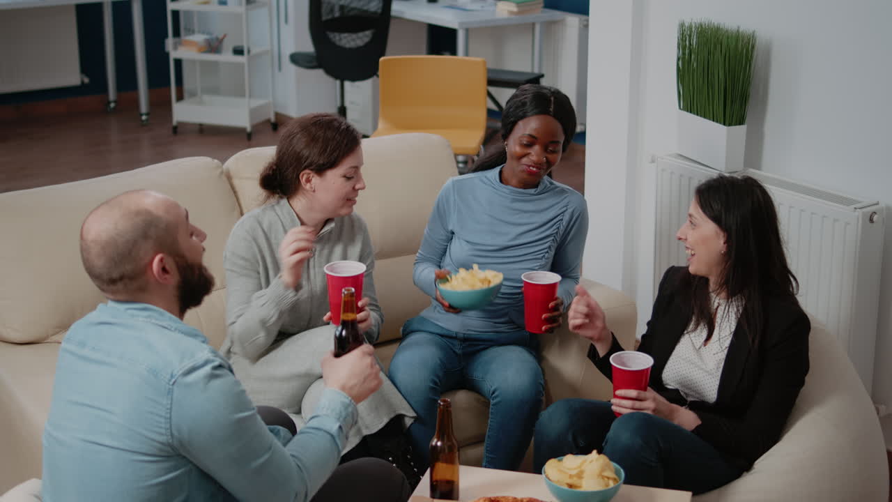 People enjoying drinks and snacks after work for leisure