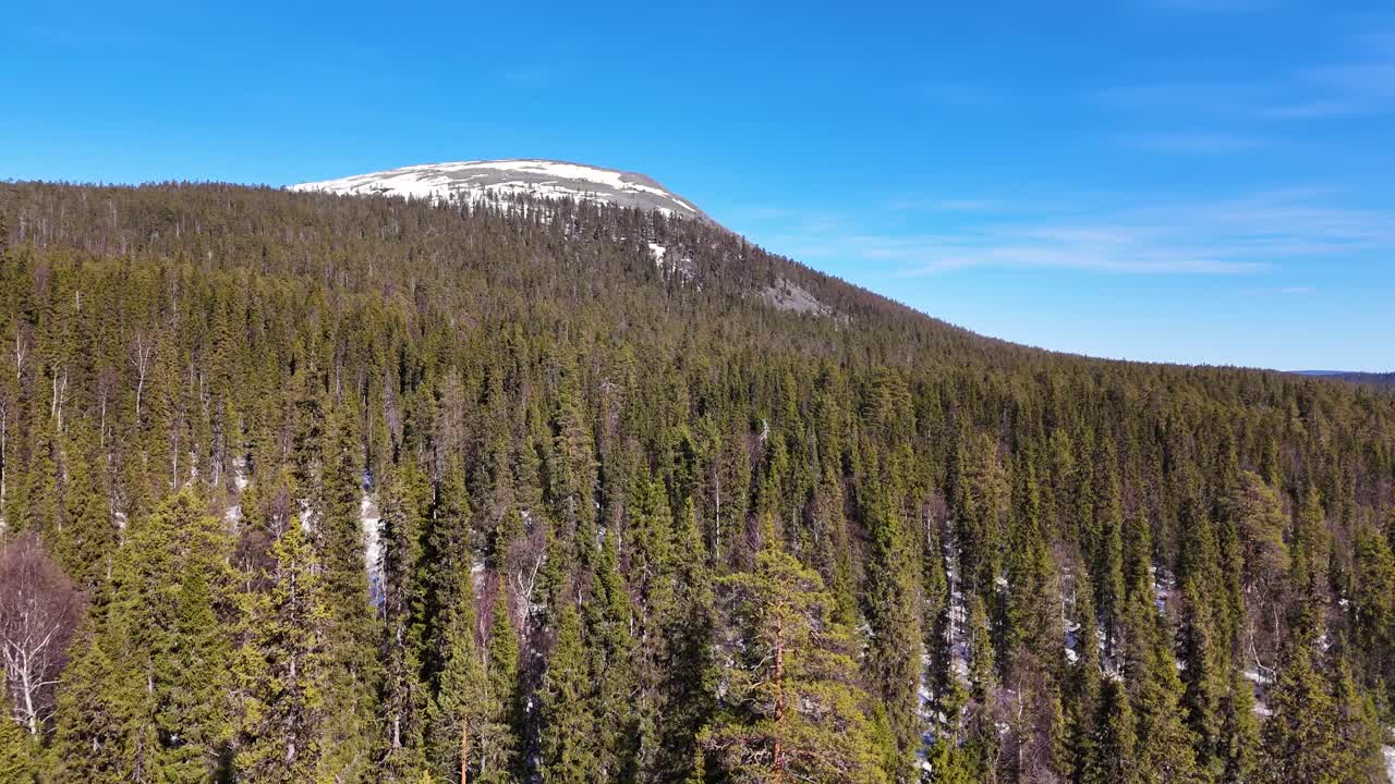 An aerial drone view to a mountain in Ylläs region in Lapland, northern Finland above the Arctic circle.