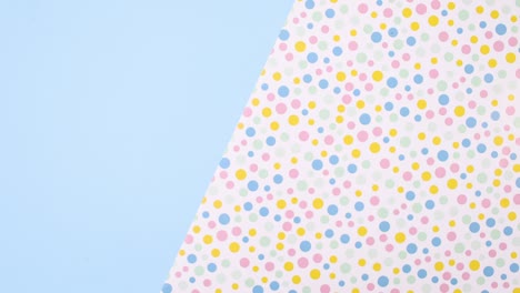cup cakes appear on white plate on left corner. stop motion
