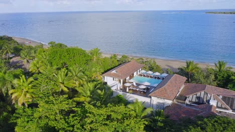 aerial view of seafront property on tropical caribbean coastline