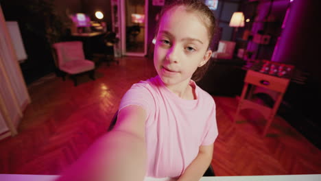 gen z kid filming pov style video with phone for online channel, talking with viewers