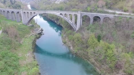 aerial view of solkan bridge above isonzo river