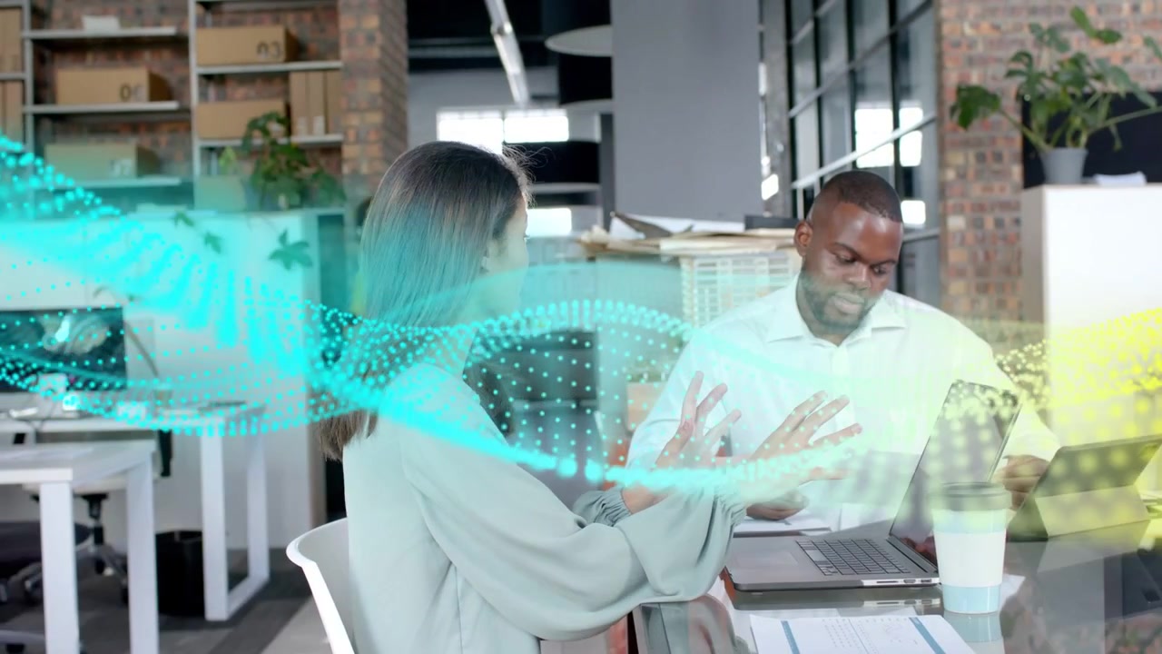 Woman explaining, gesturing, man reading docs, glancing laptop, work dot wave flowing through hands