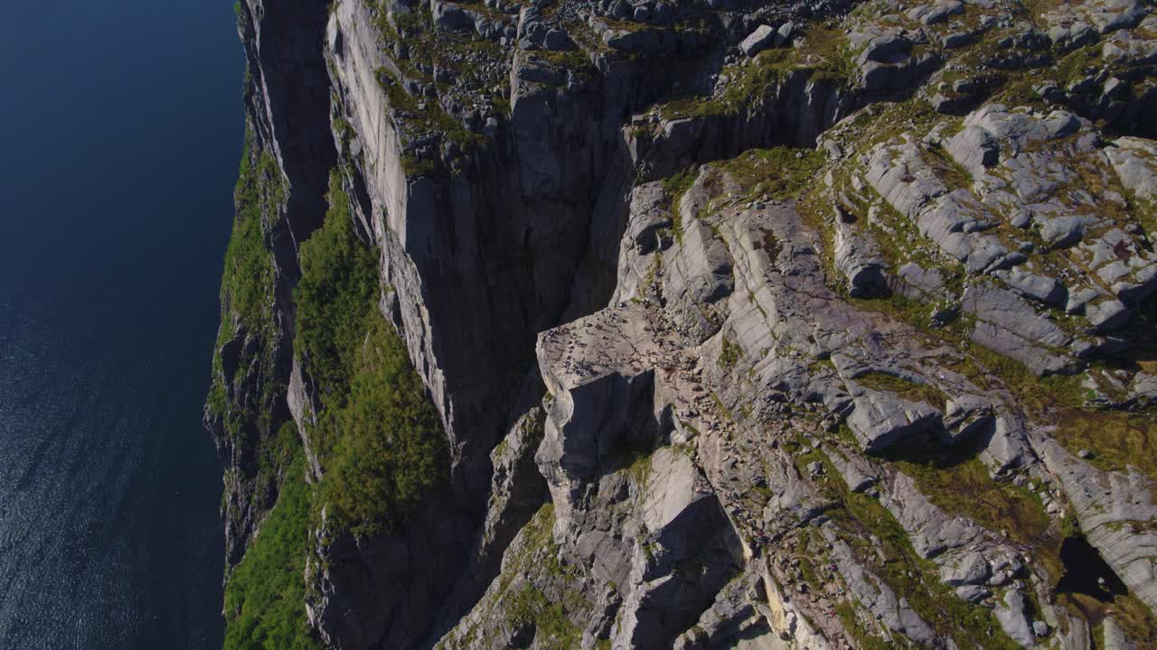Breathtaking aerial view of Preikestolen cliff overlooking Lysefjord, Norway’s dramatic fjord scenery.