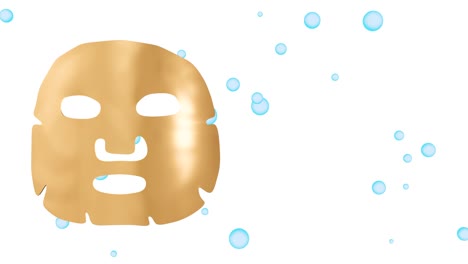 golden sheet mask for face on white isolated background with blue bubbles. cosmetic products for skincare and makeup. copy space.