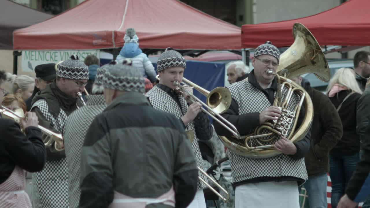 Brass band plays to the crowd in the Slavic Carnival in Melnik, Czech Republic.