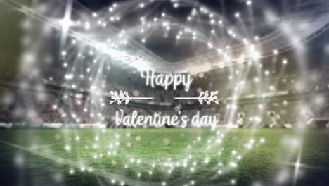 Animation-Eines-Fröhlichen-Valentinstagtextes-Und-Spots-über-Dem-Sportstadion