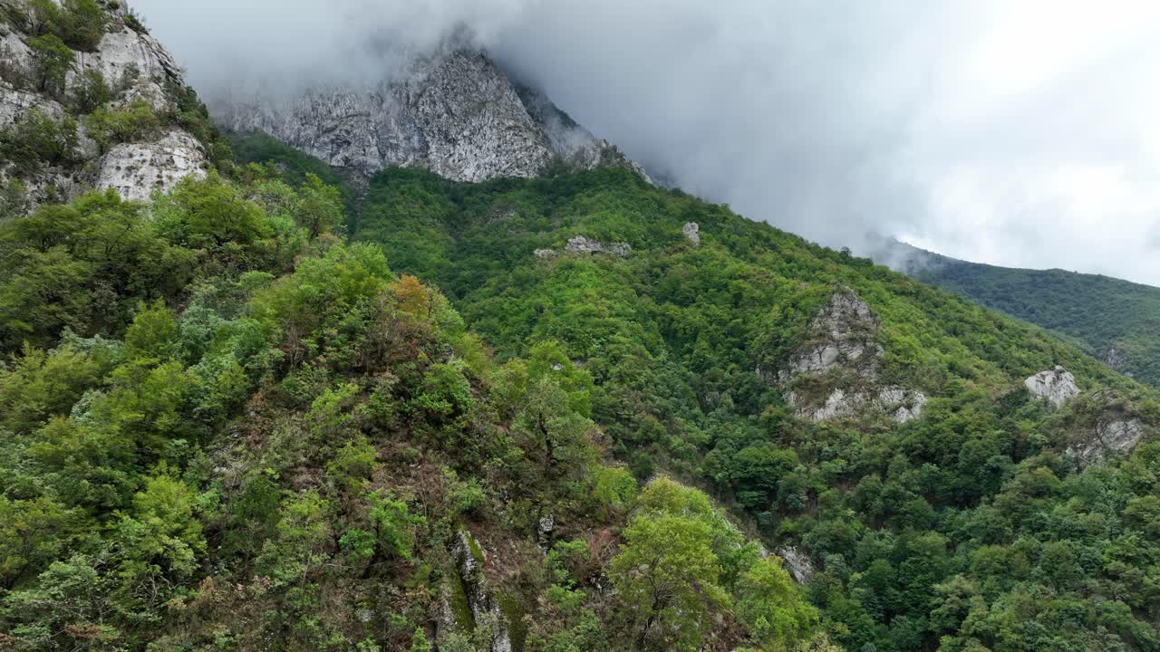 Incredible panoramic view of the densely forested hills in the Lake Komani region, Albania.