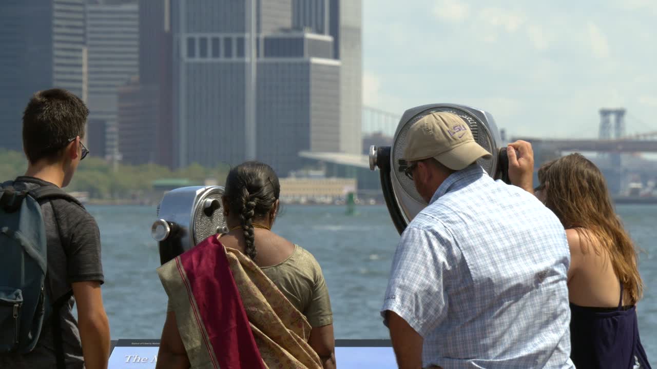 Family Looking Over Downtown New York