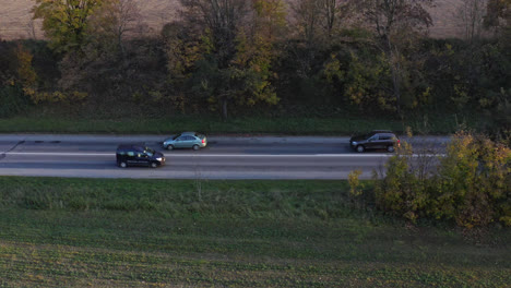 cars and truck travelling on a two-way countryside road in slovakia