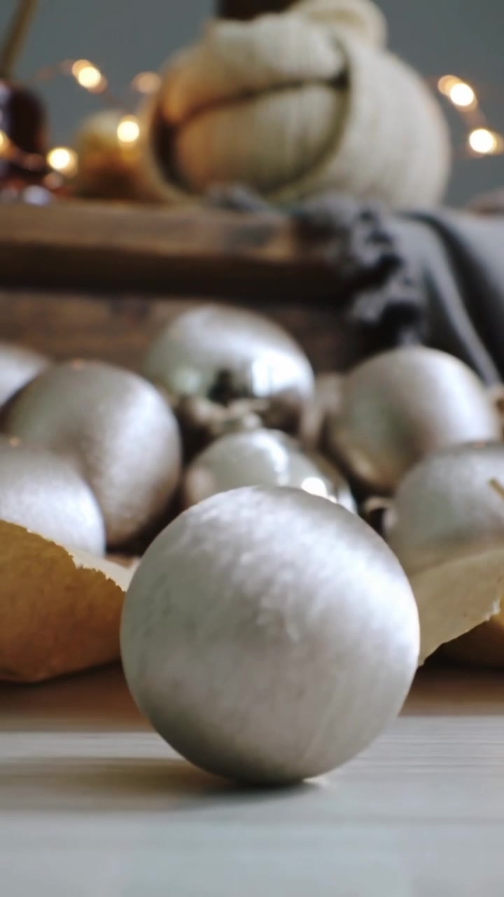 Vertical video: After pullback front sphere rolling to lens at home to shift focus