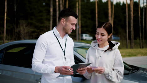 woman receiving driving license