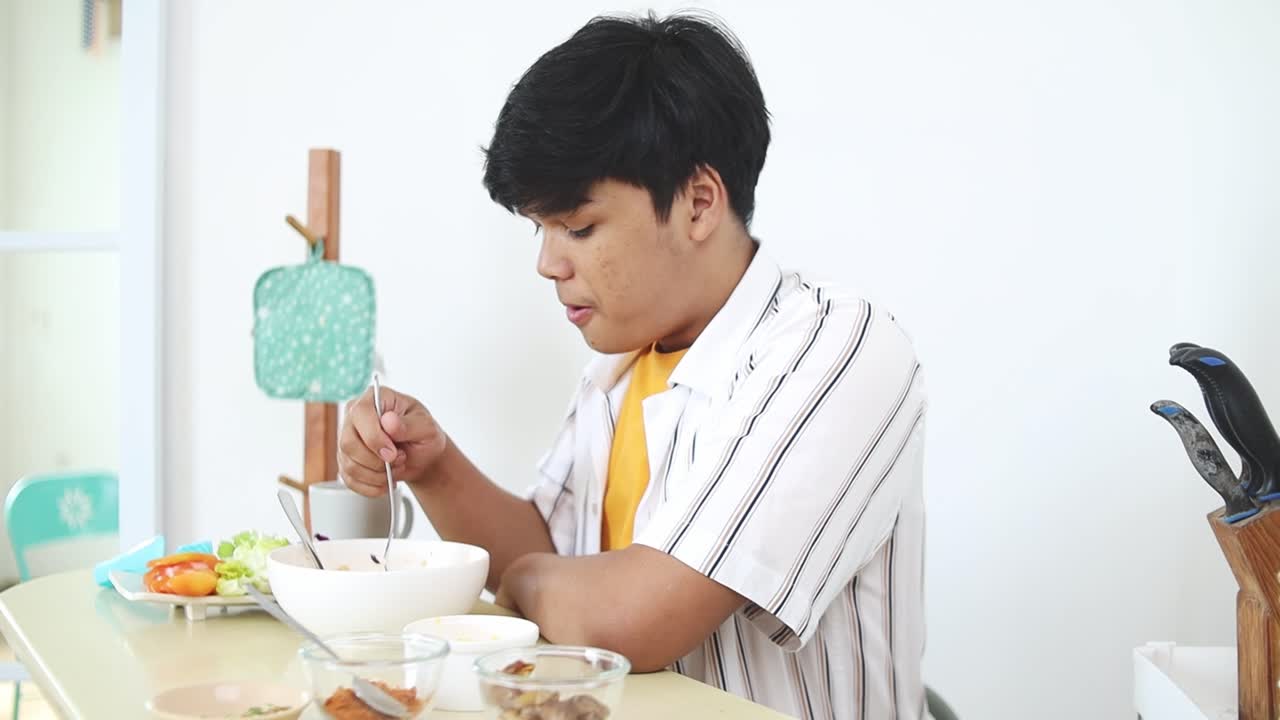 A person eating a meal indoors