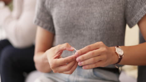 Engagement-or-wedding-ring-on-finger-of-woman