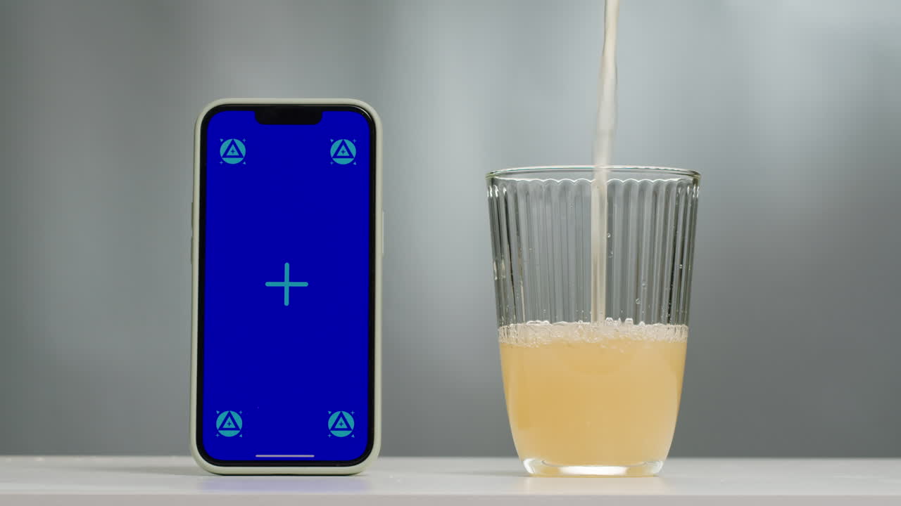 Orange or white wine bottle and glass, spanish french apple cider pouring, pouring of ecological natural wine.