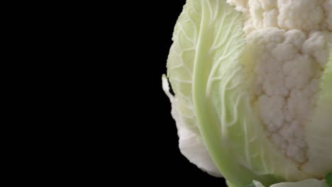 shooting of rotating cauliflower on black background