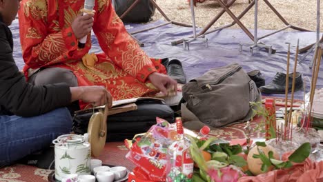 People-pray-to-god-for-a-better-future-in-the-Long-Tong-festival,-held-in-Bac-Son-town,-Lang-Son-province,-Vietnam