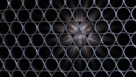 abstract background of steel pipes stacked on a pallet