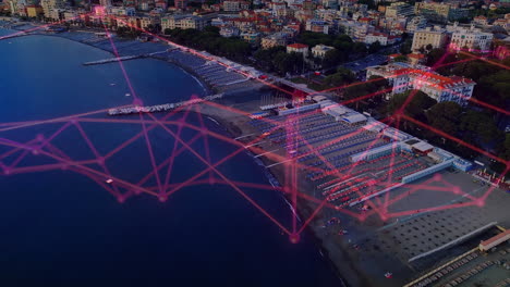 beachfront being visualized from above, showing loungers and umbrellas overlaid with pink network