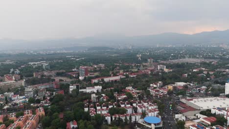 expanded drone view of southern mexico city on a cloudy day