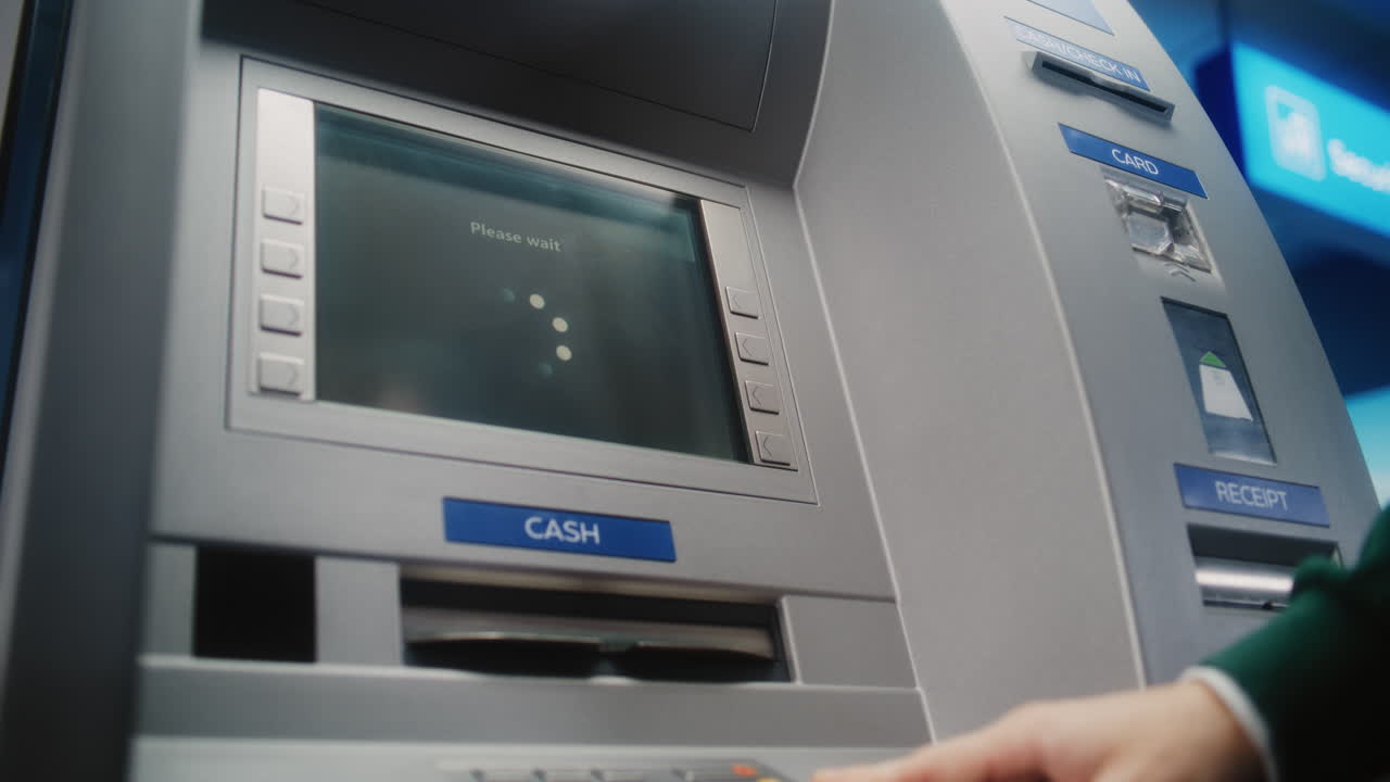ATM User Entering PIN Code on ATM Keypad for Money Withdrawal. Error Message on Cash Machine Screen About Cancelled Transaction Due to Lack of Cash. Cash Transactions, Banking System. Close Up Shot.