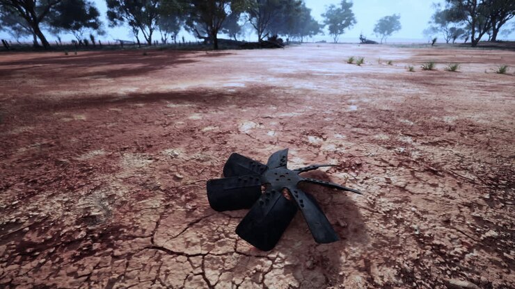 Una pala di ventilatore arrugginita giace abbandonata nell'outback australiano