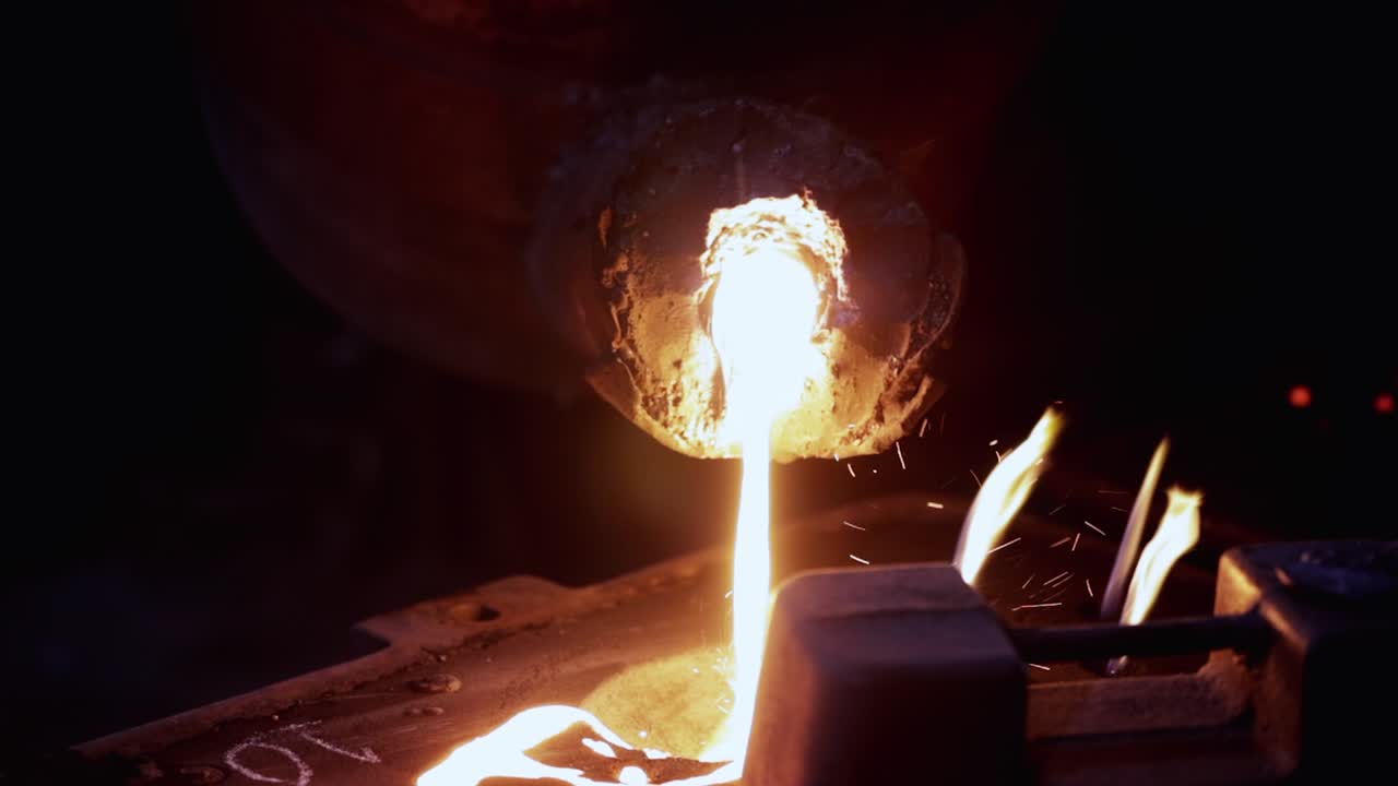 Foundry - molten metal poured from ladle