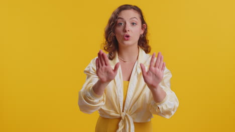 young woman warning with admonishing finger gesture saying no be careful slowly avoid danger