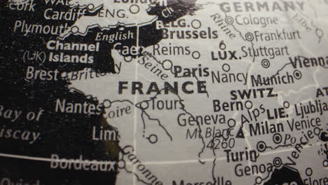 close-up of a globe showing france and western europe